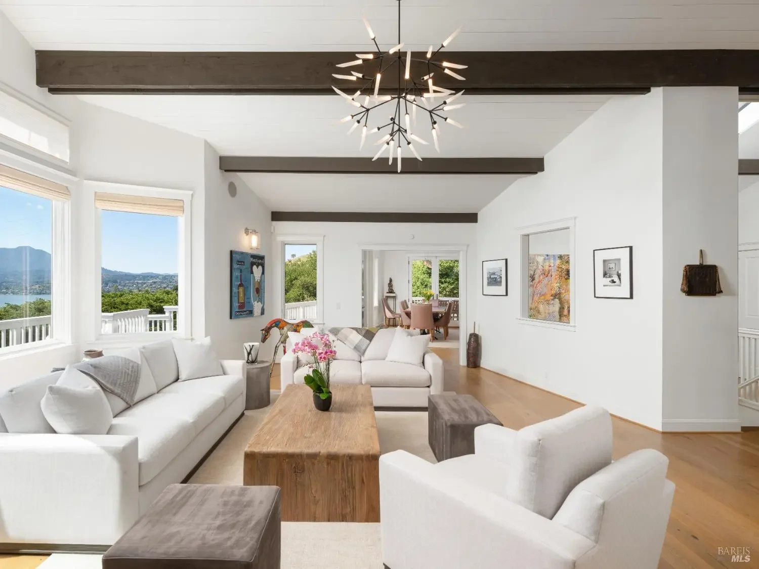 Second living room with bay view and chandelier
