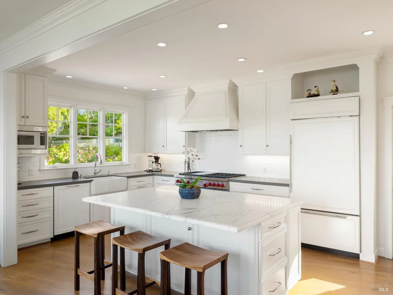 Gourmet chef's kitchen with marble island
